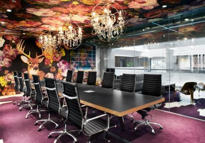 Colourful boardroom with purple floor at Workplace One King West