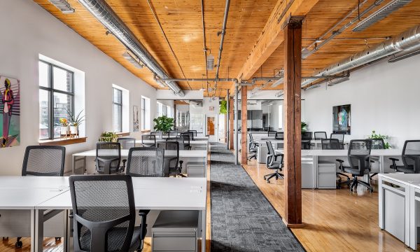 Large office suite with desks at Workplace One Queen